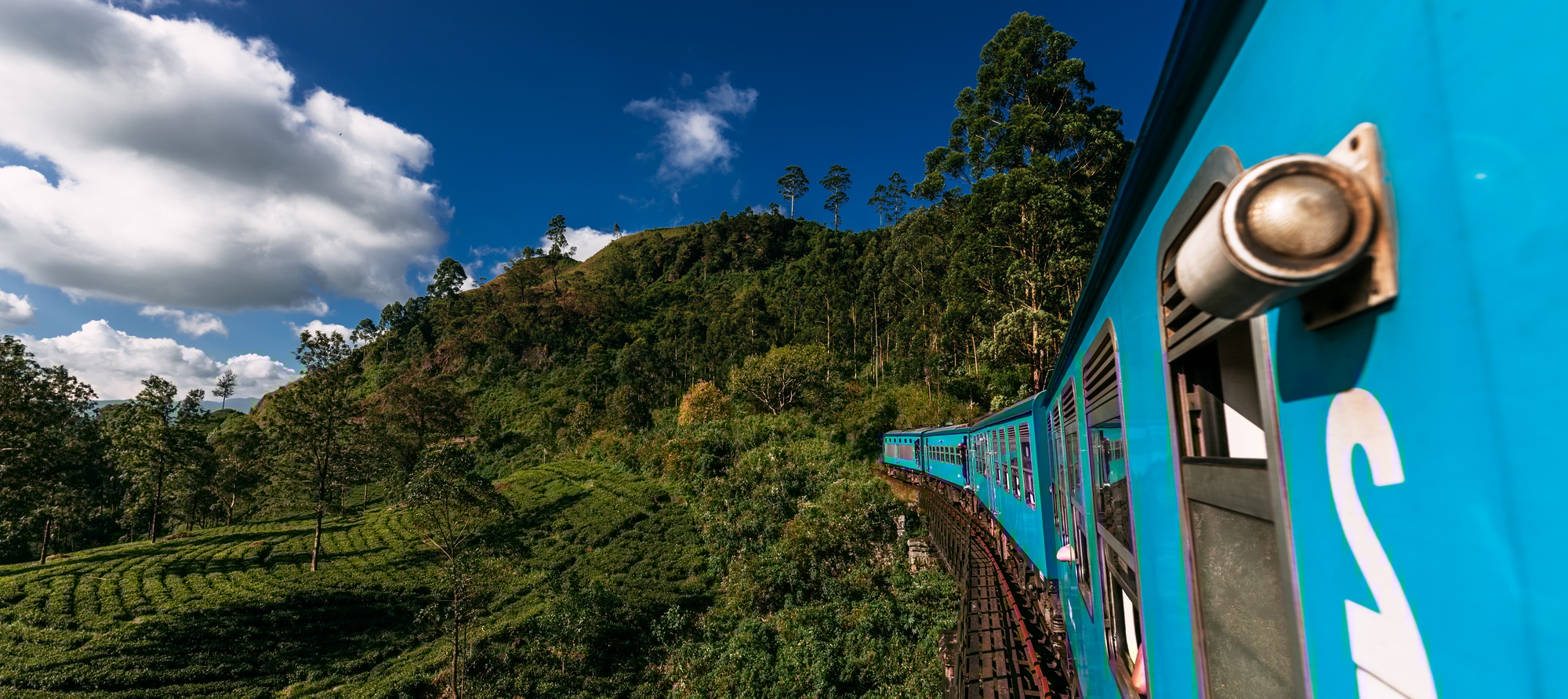 Blue train in Sri Lanka, panorama. Train from Ella in Nuwara Eliya in Sri Lanka island