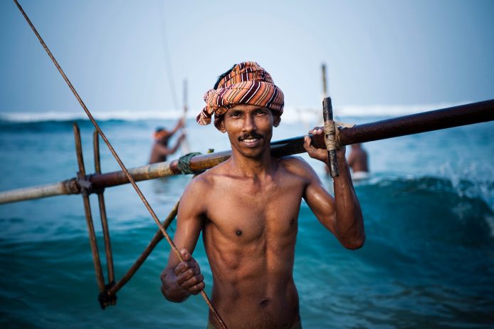 Smiling stilt fisherman in Sri Lanka