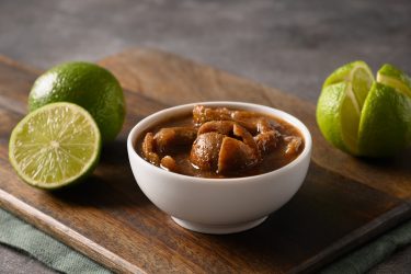 Sri Lankan Lime Pickle of lime, salt, chilli, pepper.